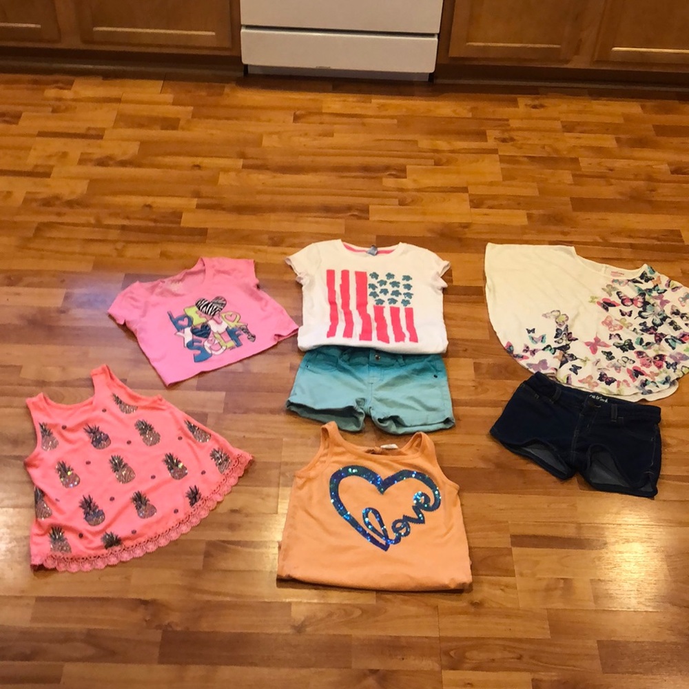 6 items of clothing :) Justice, SO, Cat and Jack